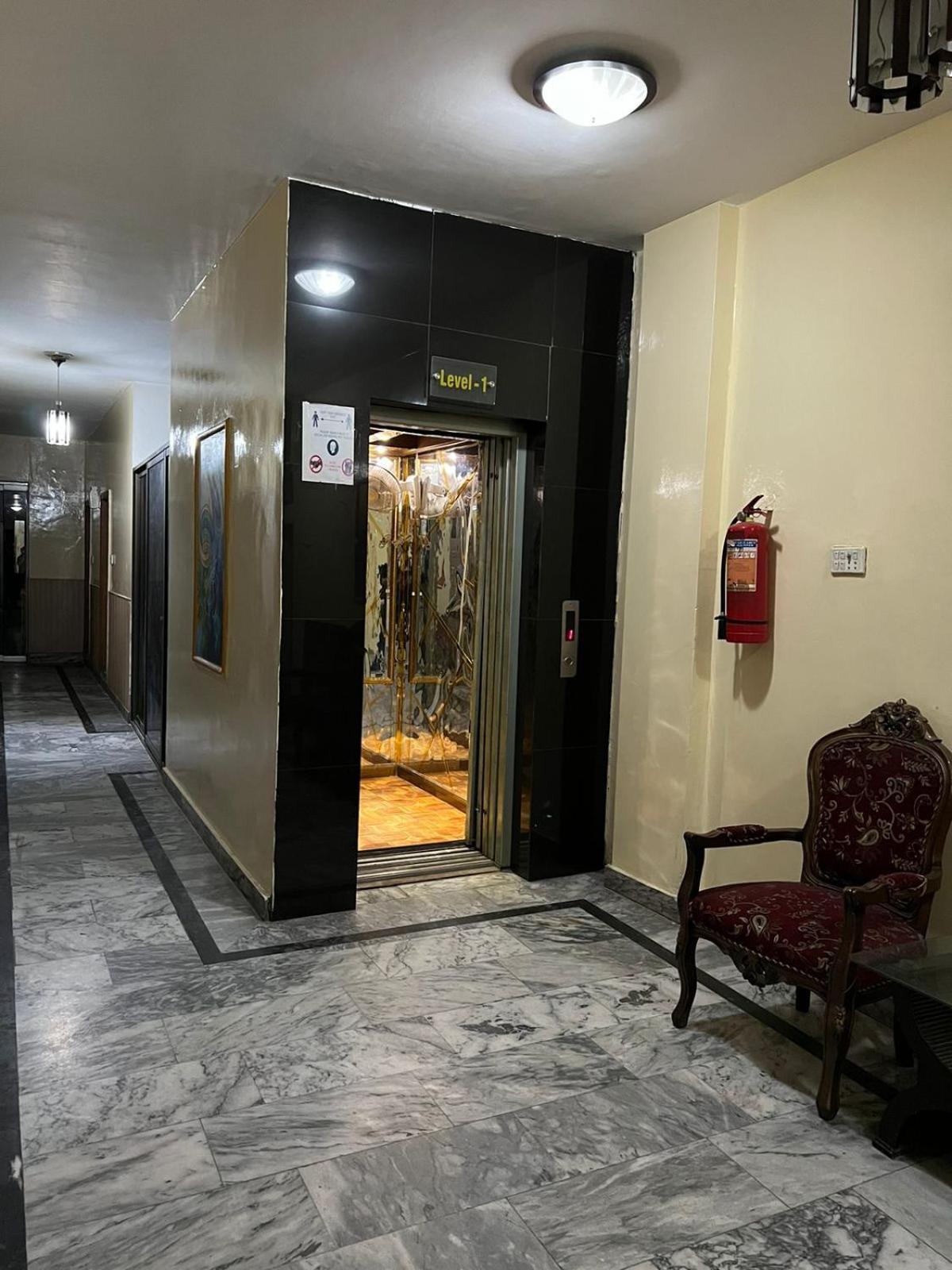 Hotel Tourist Inn Лахор Екстериор снимка